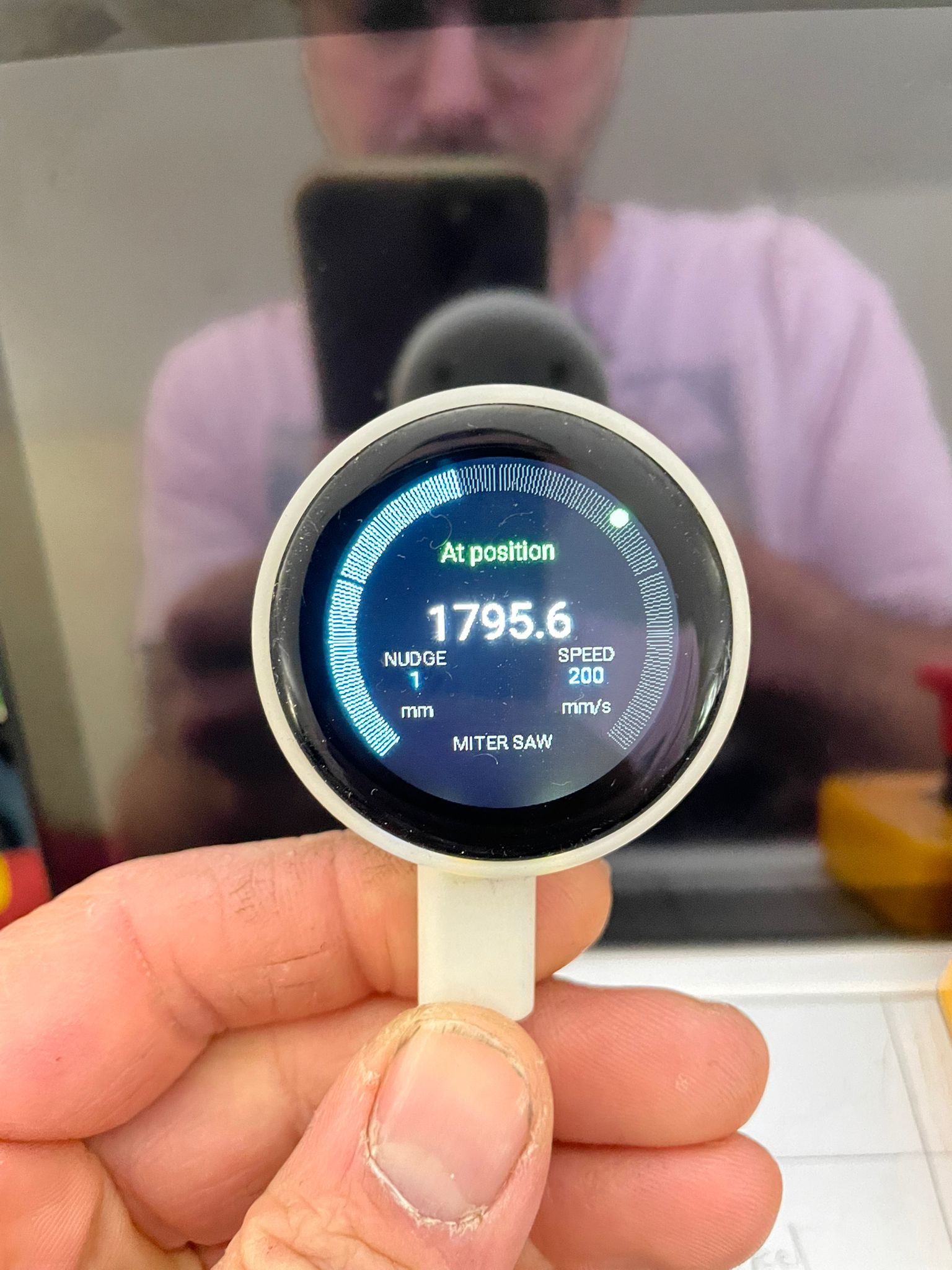 The DigiGauge — round display showing fence position, nudge value and motor speed